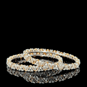 Intertwined Serpentine Diamond Bangle Set in Two-Tone Gold