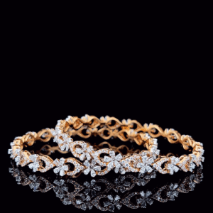 Gold diamond bangles with floral vine motif and intricate design