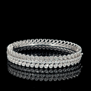 exquisite diamond leaf pattern bangle in white gold